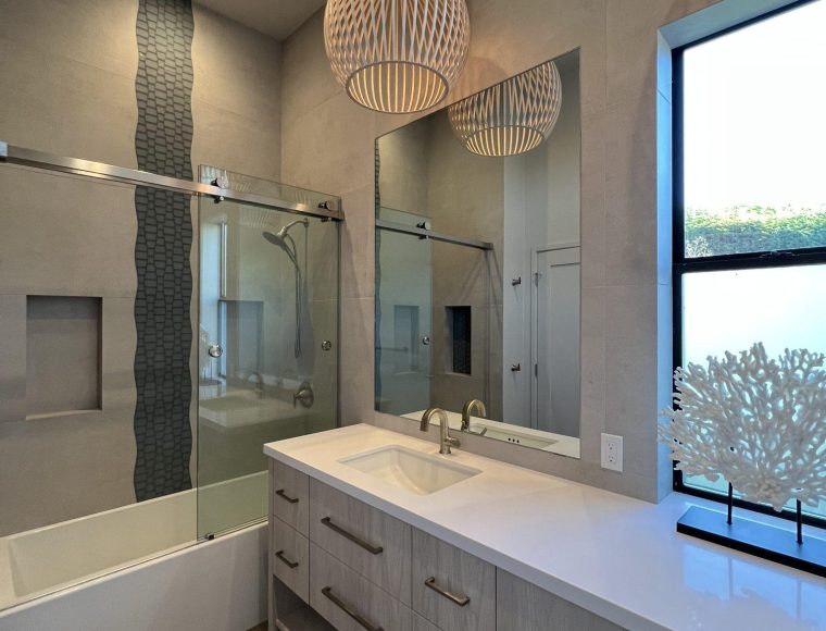 Custom bathroom featuring spacious countertop and modern lighting by Sonoma County's Premier Firm for Custom Homes + Remodeling LEFF Design Build.