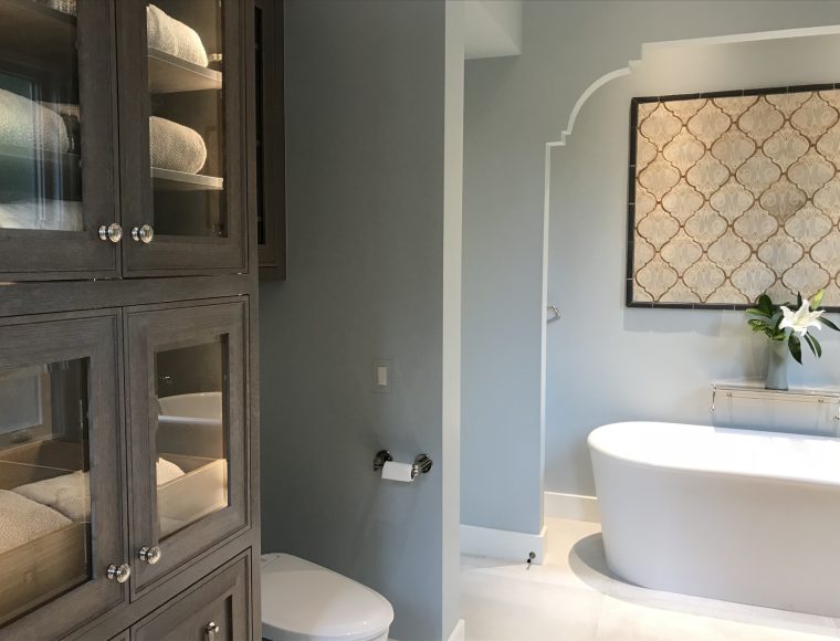 Custom bathroom featuring a soaking tub and linen/towel storage by Sonoma County's Premier Firm for Custom Homes + Remodeling LEFF Design Build.
